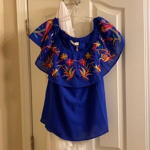 Off the shoulder tropical print top.